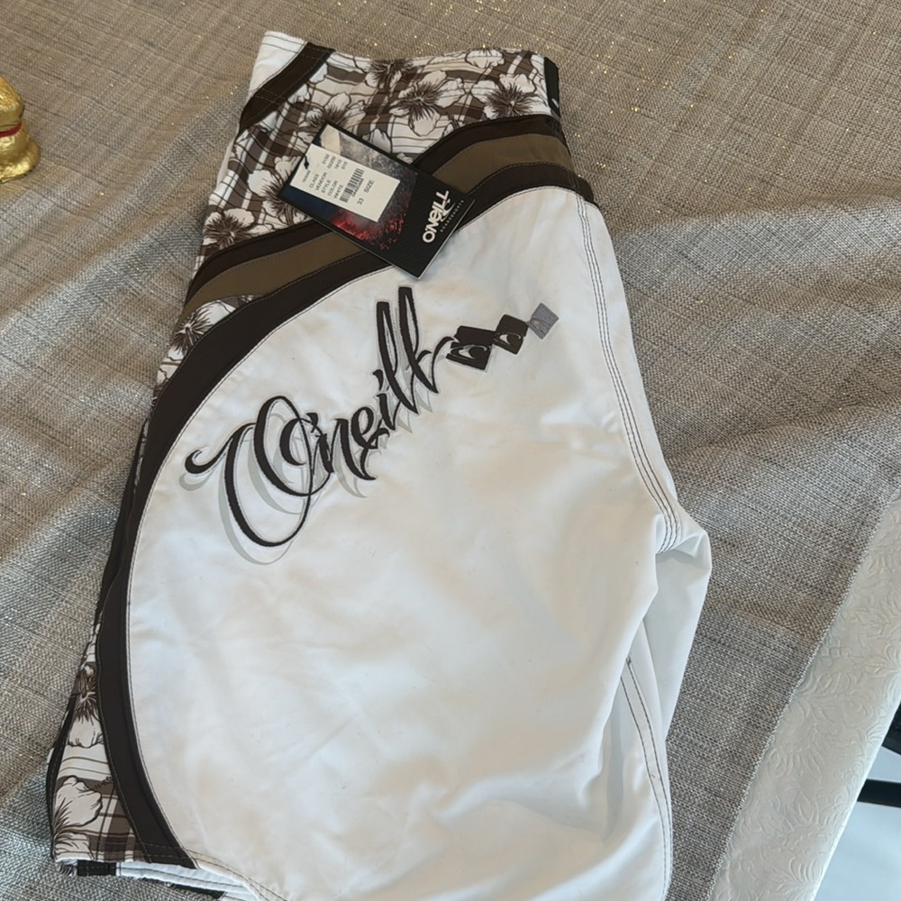 O’Neill Board Shorts. Brand New!  Size 33. White with brown